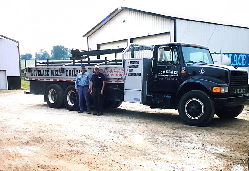 lovelace-men-standing-pump-truck